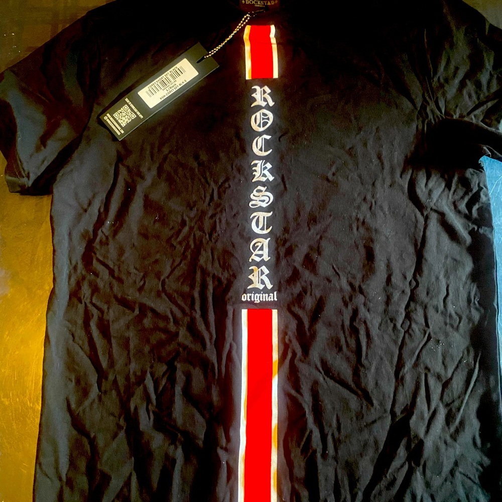 ROCKSTAR BRAND. Size Small. UNISEX. Tags Still On The Shirt.